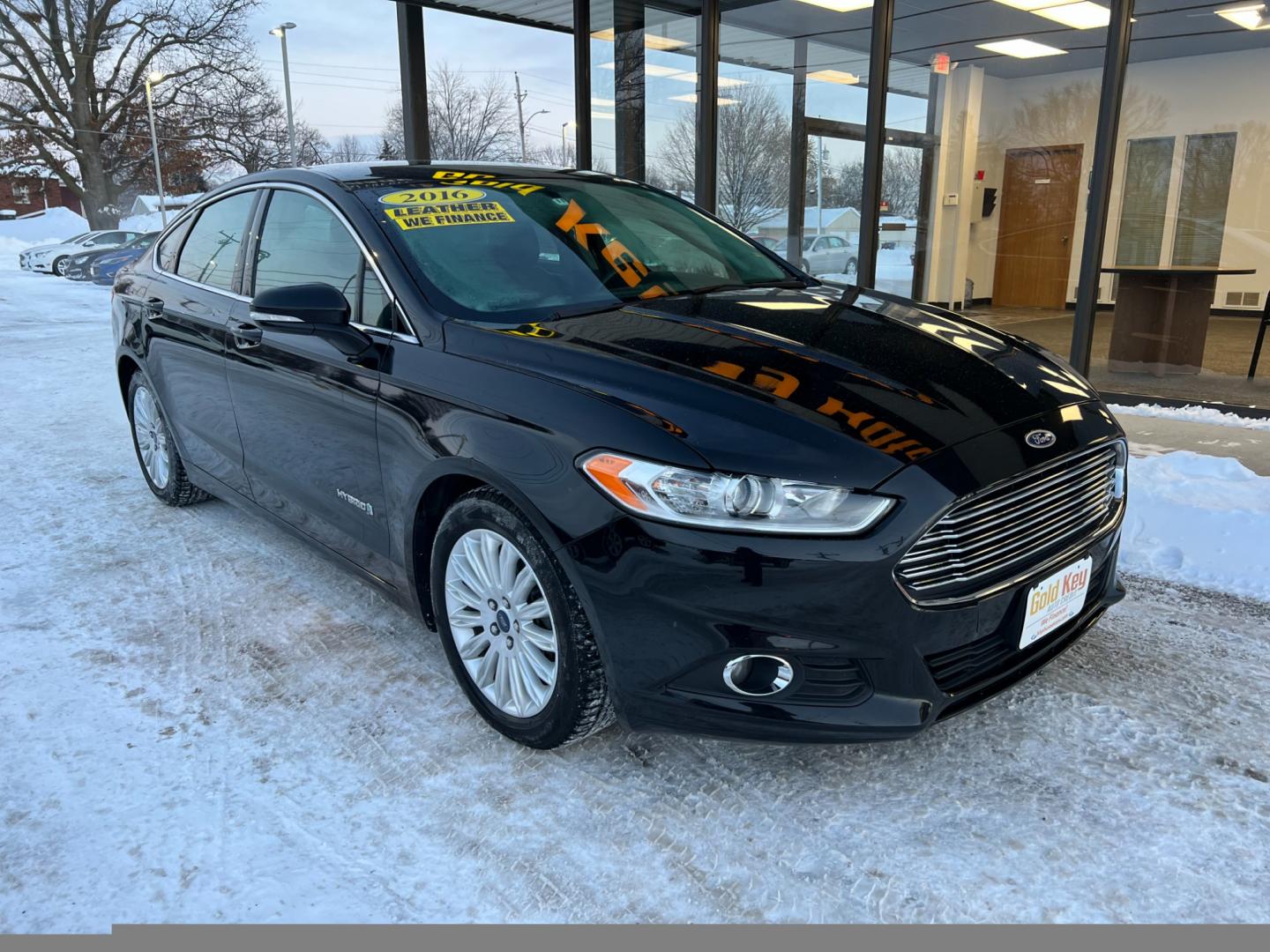 2016 Black Ford Fusion Hybrid (3FA6P0LU8GR) , located at 1633 W Kimberly, Davenport, IA, 52806, (563) 323-5341, 41.559456, -90.598732 - Photo#1